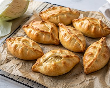 Pirozhki mit Weißkraut vegetarisch für Catering in Wien