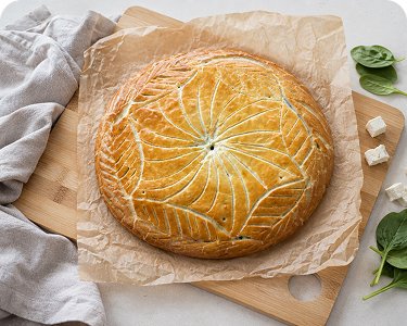 Vegetarischer Spinat-Feta-Kuchen für Catering in Wien